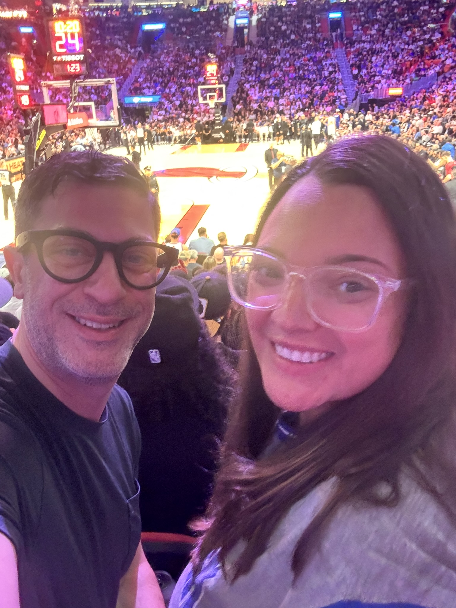 David and Gina in the stands at a New York Knicks and Miami Heat basketball game
