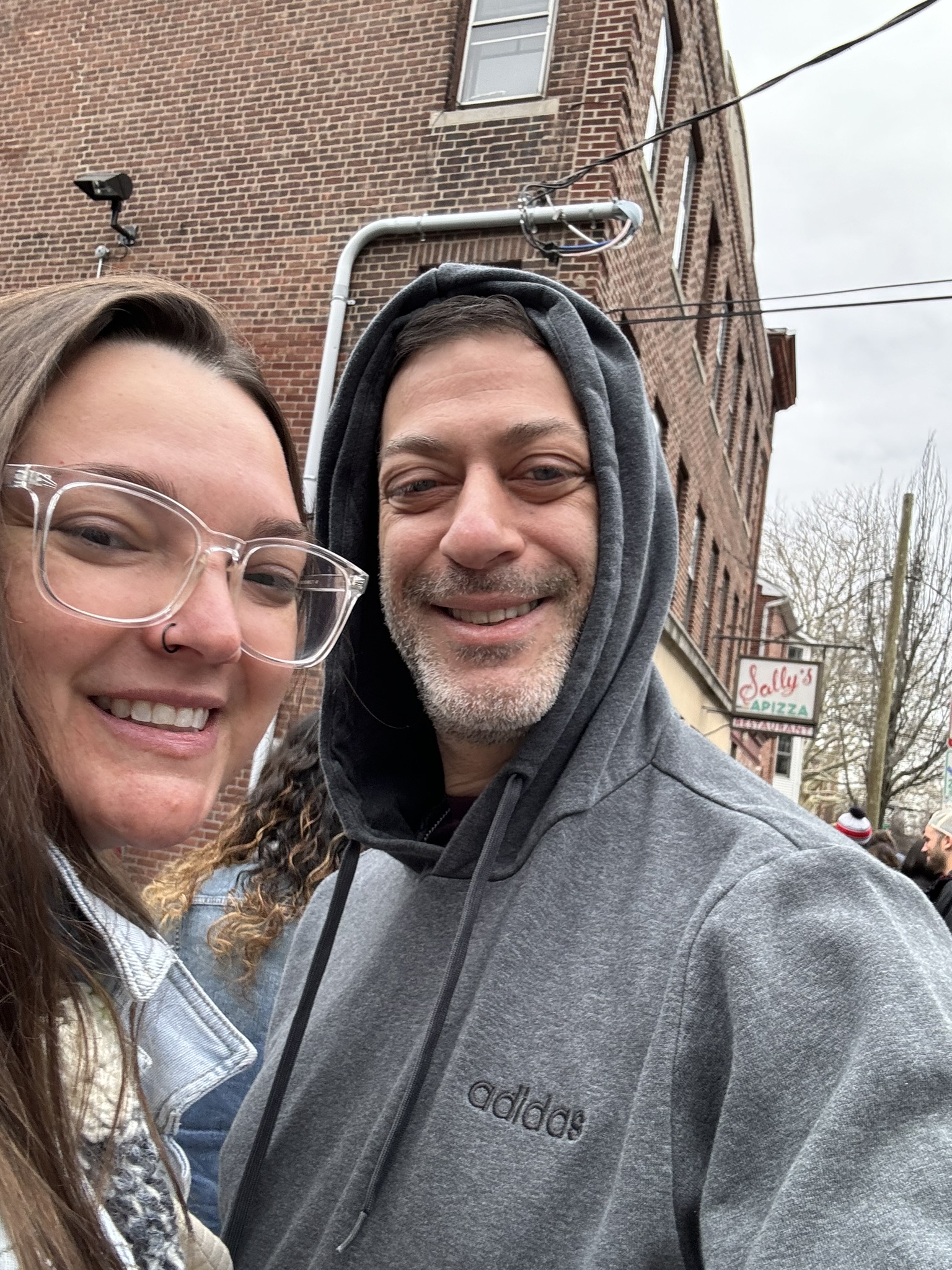 Gina and David outside Sally's Apizza in New Haven
